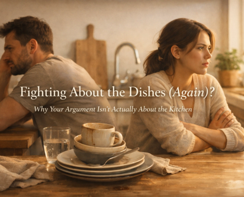 Couple sitting back-to-back in kitchen after arguments about chores in relationships